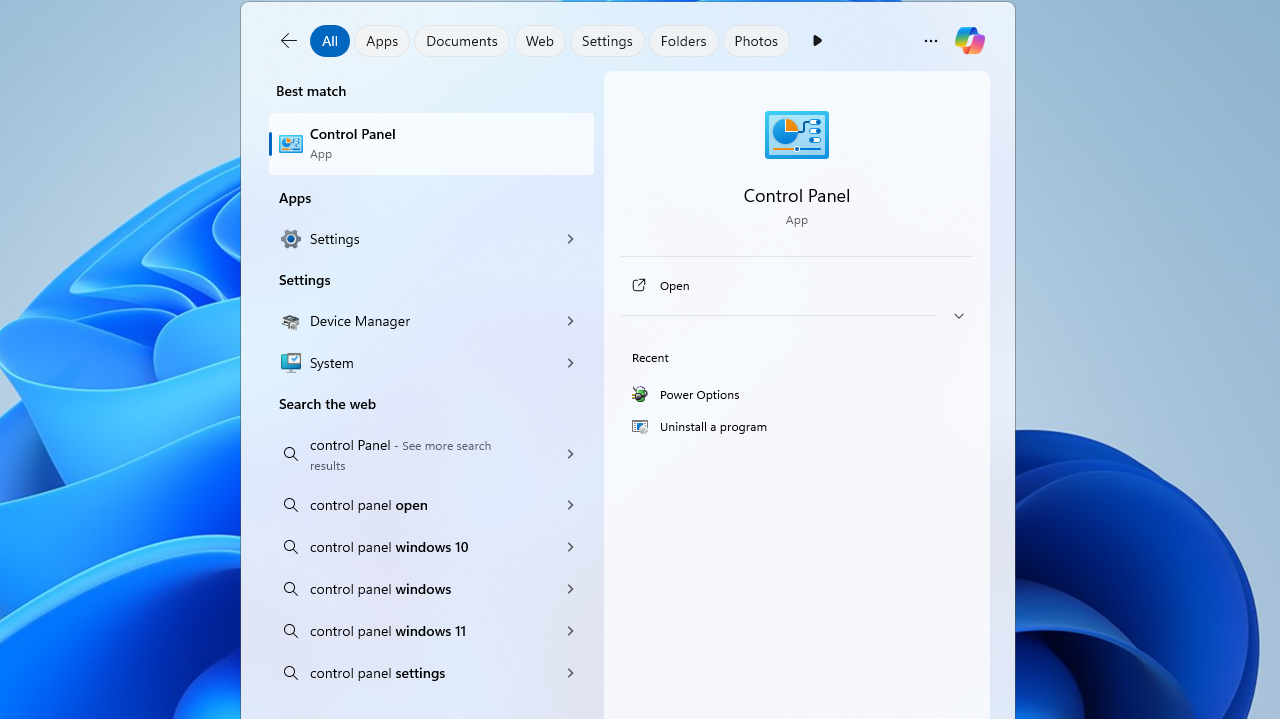 Type “Control Panel” in the search bar and click to open.